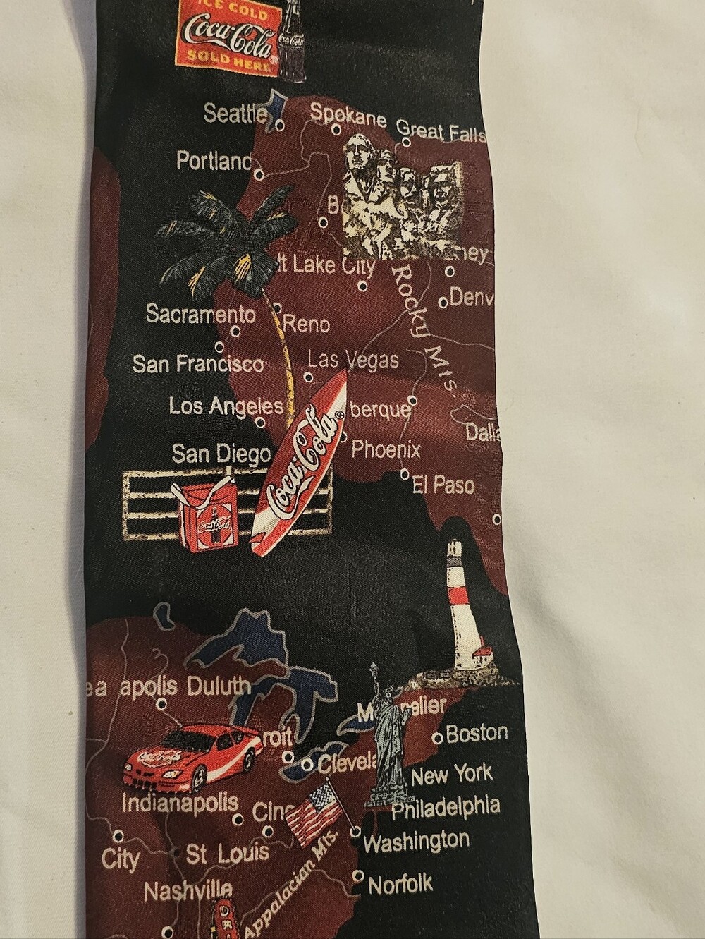 Men's Novelty Black & Burgundy Tie with Travel & Coca-Cola Motifs